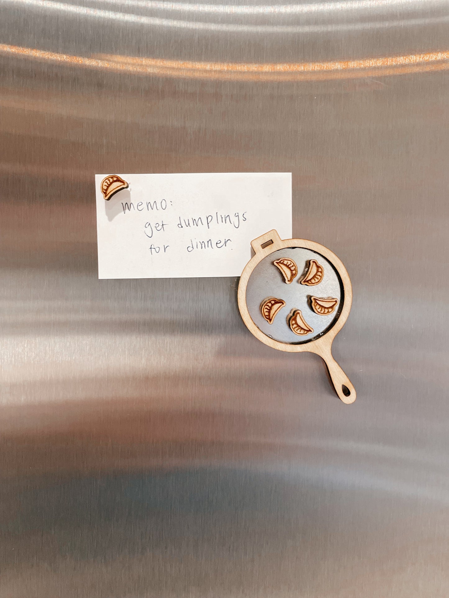 Tiny pan-fried dumpling magnets with frying pan