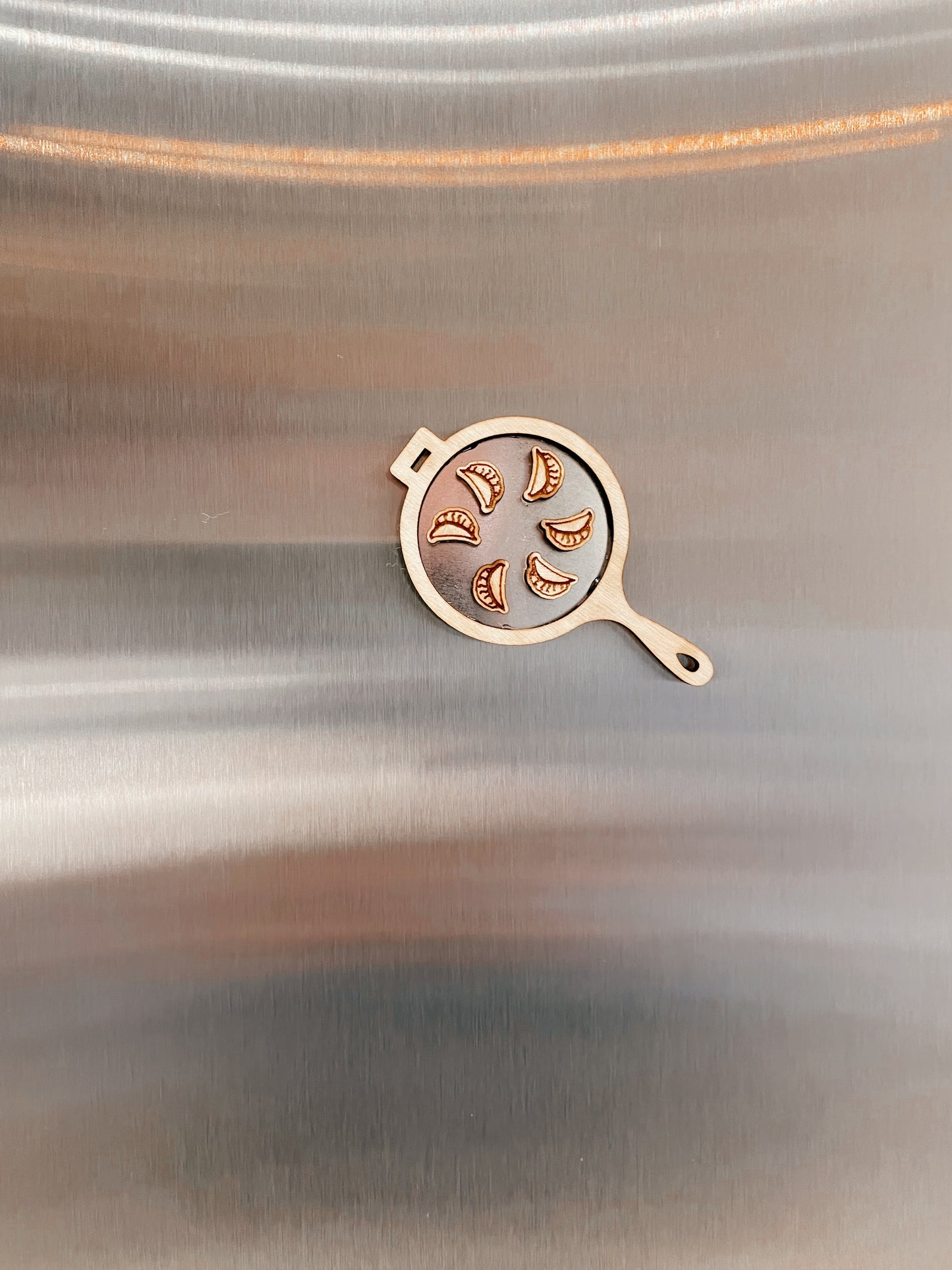Tiny pan-fried dumpling magnets with frying pan