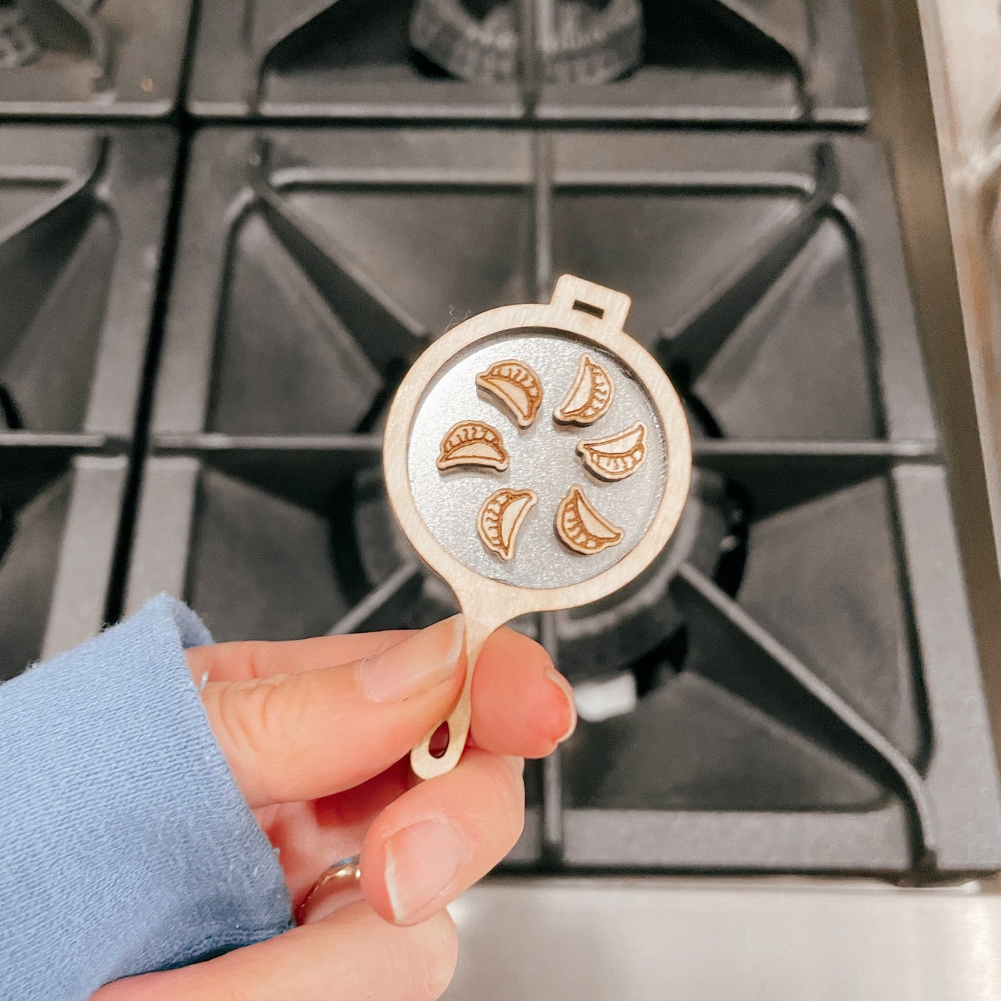 Tiny pan-fried dumpling magnets with frying pan